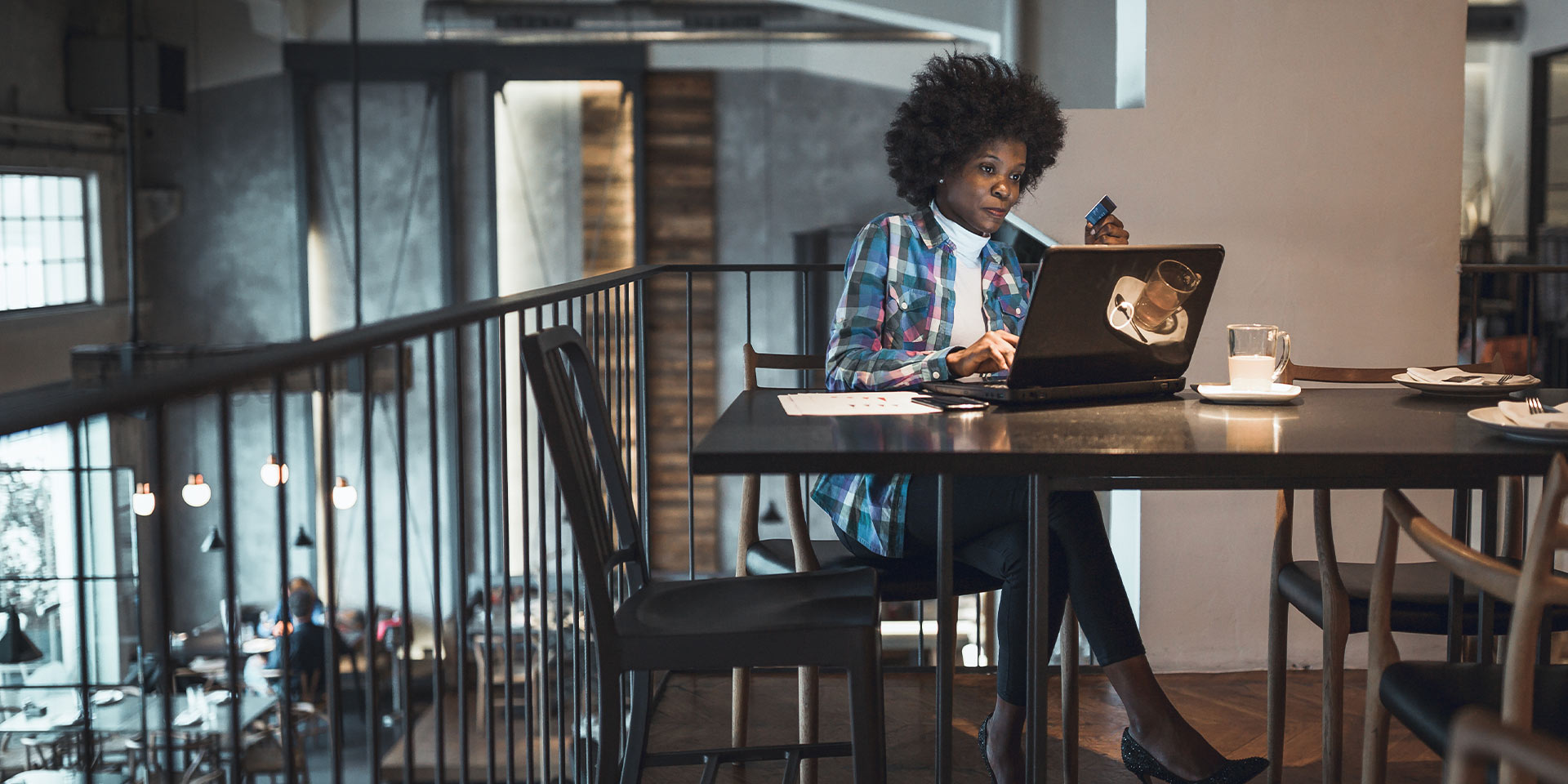 Woman at desk using laptop